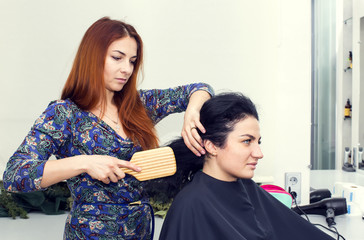woman in a beauty salon doing hair