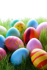 Many Colorful Easter Eggs On Green Grass