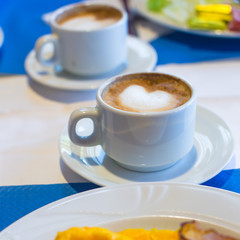 Delicious and tasty cappuccino for breakfast at a cafe