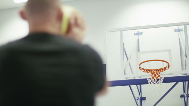 Basketball player scoring five free throws consecutively