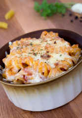 rotini spiral pasta gratin on table