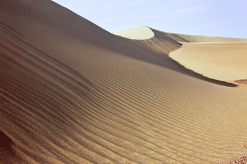 Fototapeta na wymiar Riserva di Paracas, il deserto in Perù. Lavoro del vento