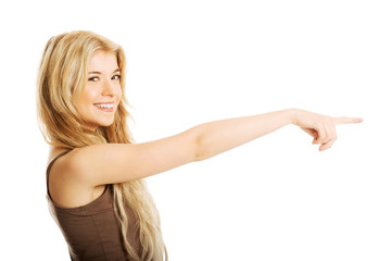 Student woman pointing to the right