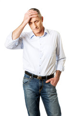 Fototapeta premium Mature man with huge headache