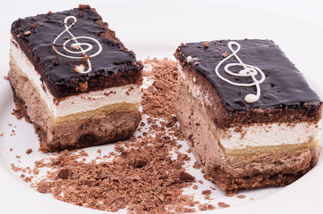 Two chocolate cakes on a white plate isolated on white backgroun
