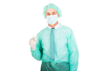 Male doctor holding a syringe