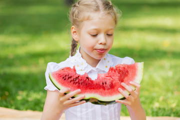 Girl eating watermelon