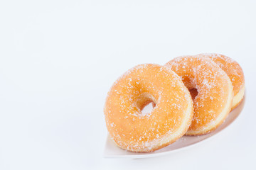 Delicious Sugar Ring Donut with a White paper Background
