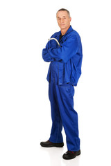 Full length repairman holding wrench