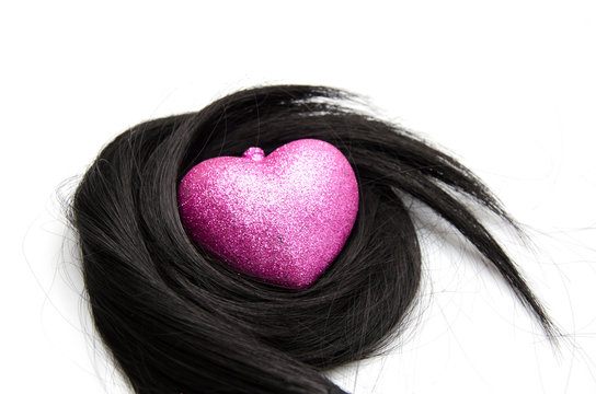 Hair with heart shape protection on whiteb ackground