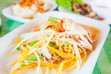 Seafood Crab papayd salad on plate.