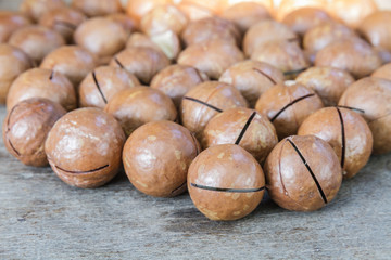 Macadamia on wood table.