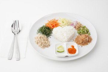 Nasi kerabu or kao yum, Southen Thai-Style rice with herbs and v