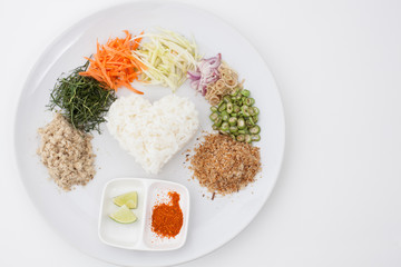 Nasi kerabu or kao yum, Southen Thai-Style rice with herbs and v