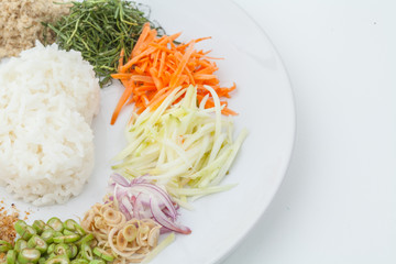 Nasi kerabu or kao yum, Southen Thai-Style rice with herbs and v