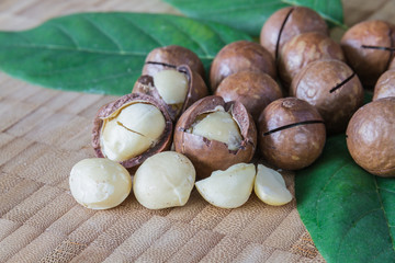 Macadamia on wood table.