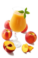 Glass of juice from peaches with mint