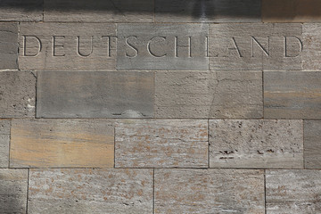 Deutschland (Germany). Word carved into the stone blocks.