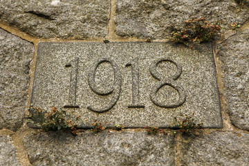 Year 1918 carved in the stone. The years of World War I.