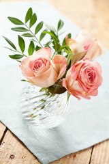 Bouquet of beautiful roses in vase