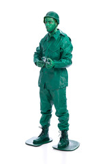 Man on a green toy soldier costume