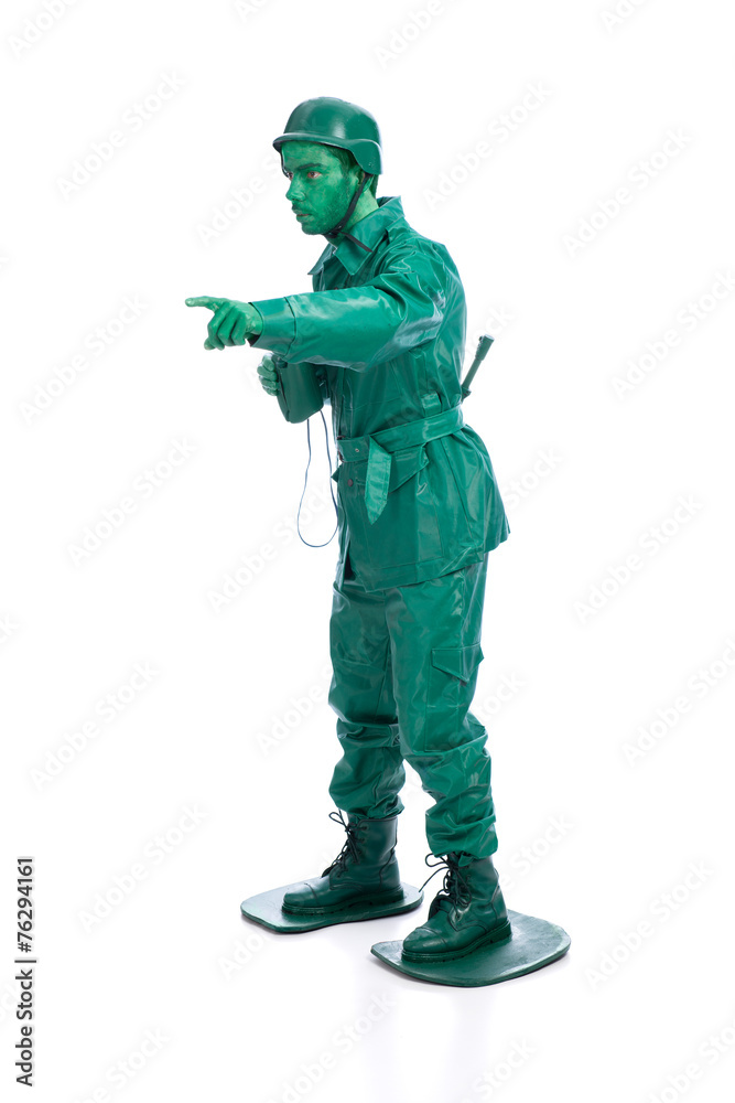 Wall mural Man on a green toy soldier costume