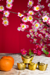 Chinese New Year Decoration plum blossom and gold bullion symbol of luck