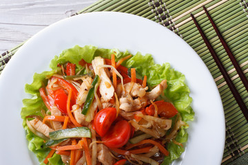 Chinese chicken salad with vegetables horizontal top view