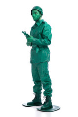 Man on a green toy soldier costume