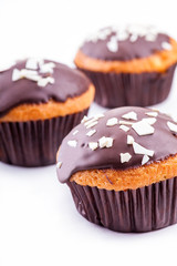 three cupcake with chocolate closeup