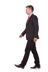 young business man walking