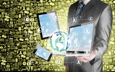Business man using tablet PC and smartphone social connection