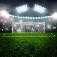 Soccer ball on green stadium arena