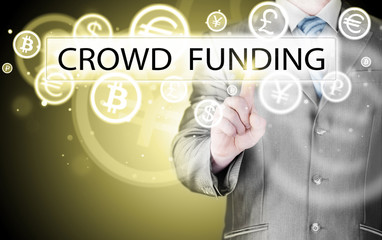 Businessman pushes virtual crowd funding button