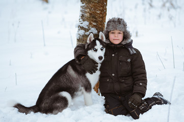 little boy with the dog