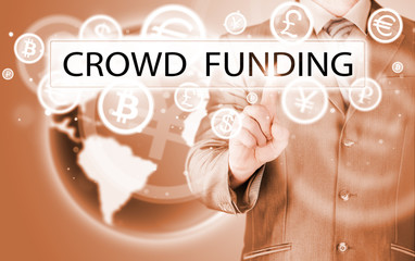 Businessman pushes virtual crowd funding button