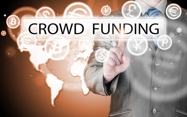 Businessman pushes virtual crowd funding button