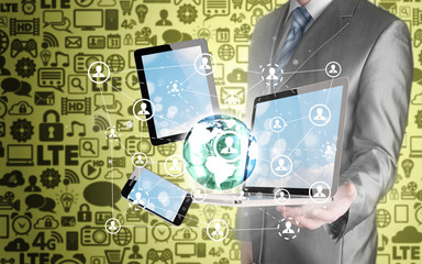 Business man using tablet PC and smartphone social connection