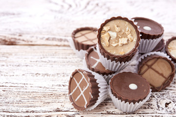 Dark chocolate on wooden background