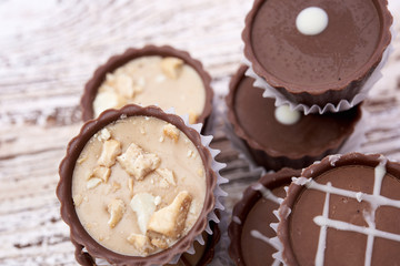 Dark chocolate on wooden background