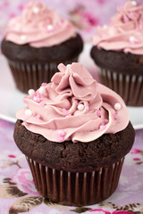 Chocolate cupcakes with pink buttercream