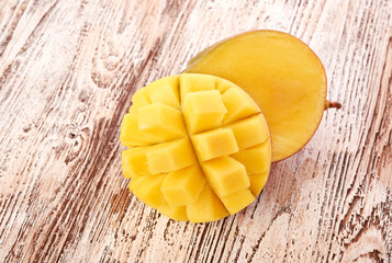 Mango fruit on wood