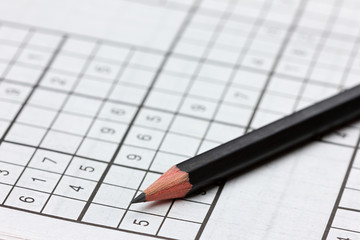 crossword sudoku and pencil, popular puzzle game with numbers