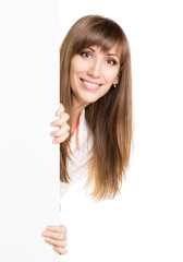 Young smiling caucasian woman holding white board