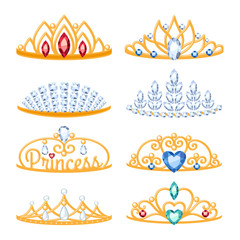 Set of beautyful golden tiaras with gemstones. © rea_molko