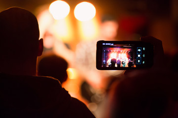 Taking a video with the smartphone during a concert