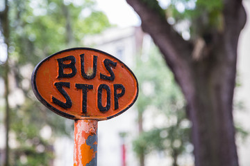 Orange Bus Stop Sign