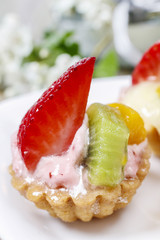 Cupcakes decorated with fresh fruits