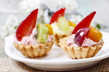Cupcakes decorated with fresh fruits