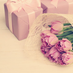 Floral background with flowers and gift